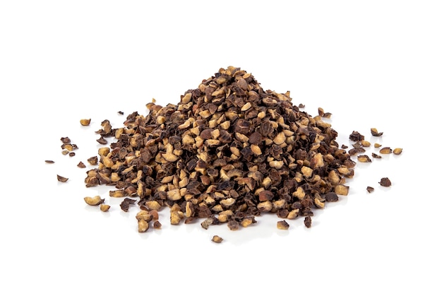 Crushed black pepper on whited background.