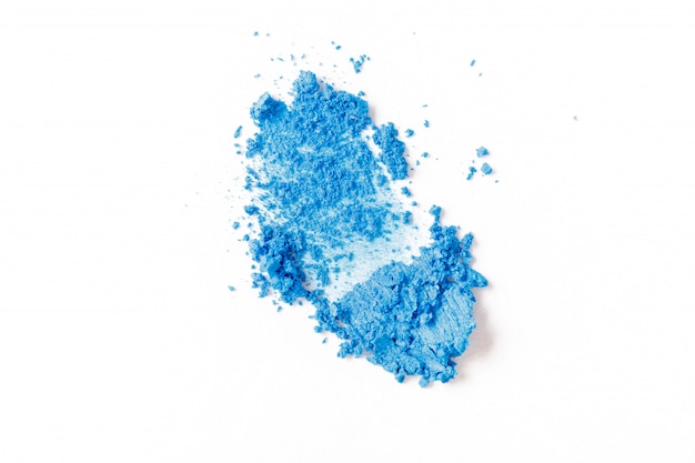 Crushed blue eye shadow isolated on white background