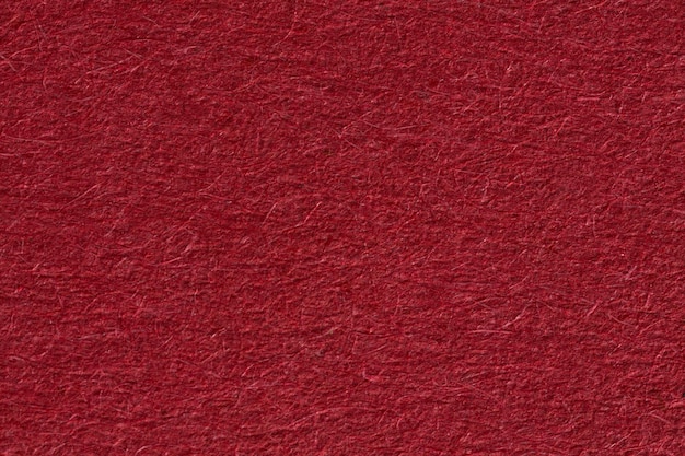 Crushed red highly textured background for christmas