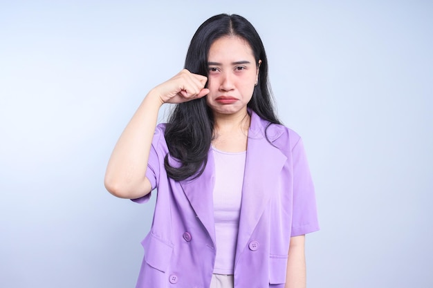 Crying Sad Young Woman Isolated on Grey Background