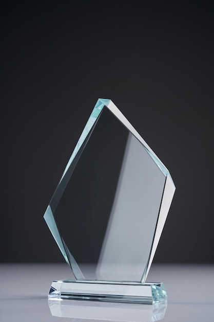 Crystal trophy against gray background