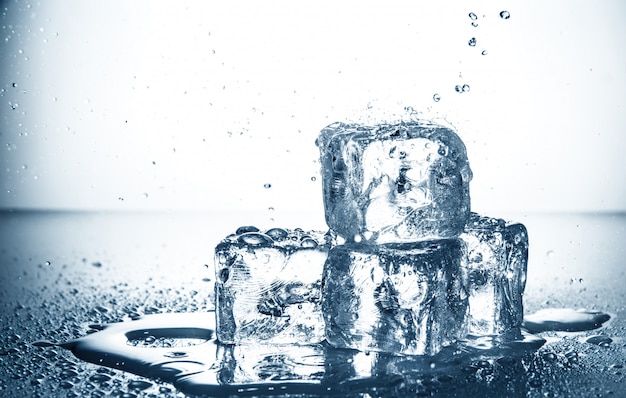 Cube in water puddle