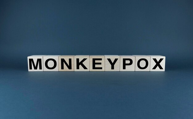 Cubes form the word Monkeypox Monkeypox virus concept