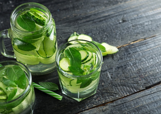 Cucumber detox water with mint leaves in glass