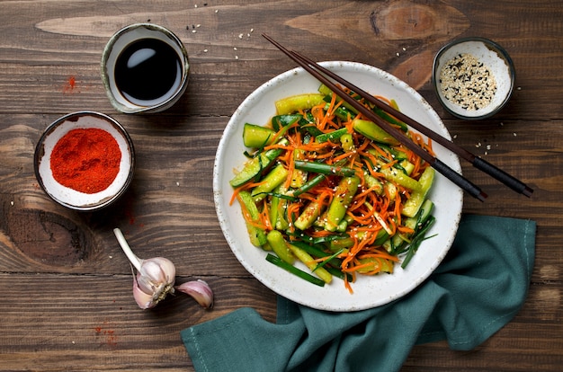 Cucumber salad with carrots and sesame seeds