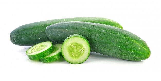 Cucumber and slices isolated over white background.