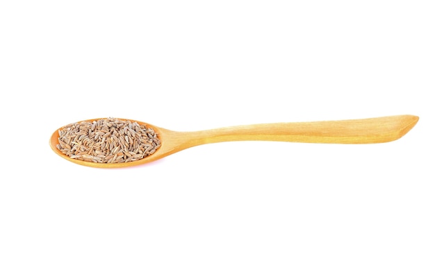 Cumin seeds in a wooden spoon