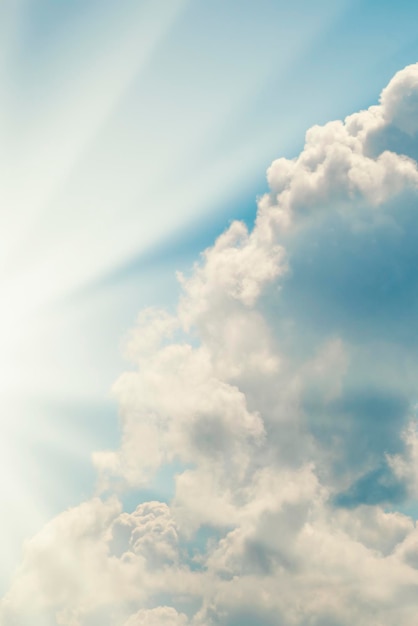 Cumulus clouds in sunlight background