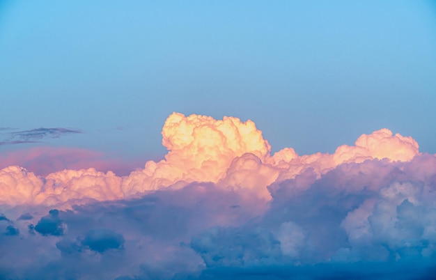 Cumulus clouds at sunset Dramatic vibrant color with beautiful cloud of sunrise and sunset