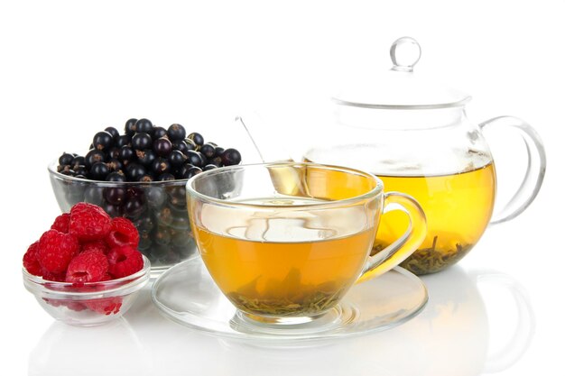 Cup of berry tea isolated on white