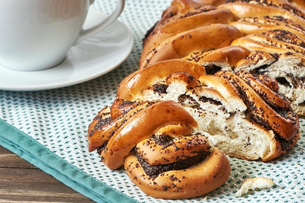 Cup of black coffee and poppy seed cake