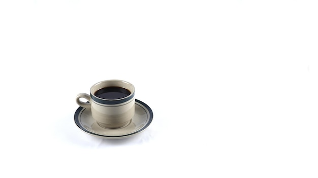 cup of black coffee on a white background. copyspace area