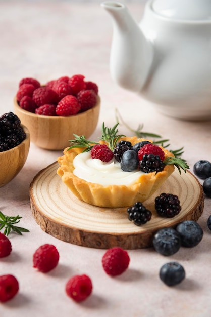 Cup cakes with composition on white backround mixed fruits