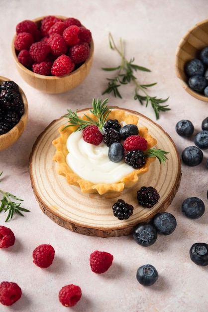 Cup cakes with composition on white backround mixed fruits