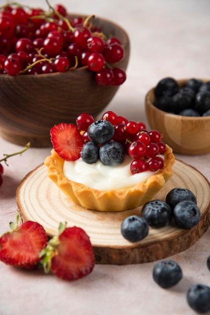 Cup cakes with composition on white backround mixed fruits