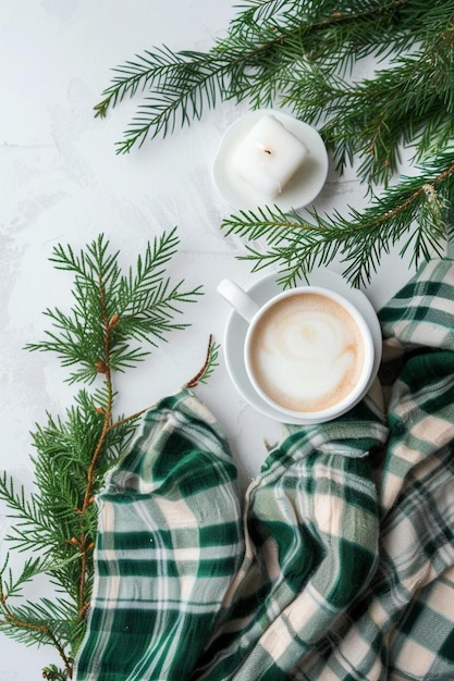 a cup of coffee and a blanket on a table