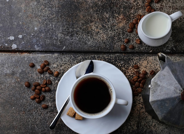 Cup of coffee and coffee beans