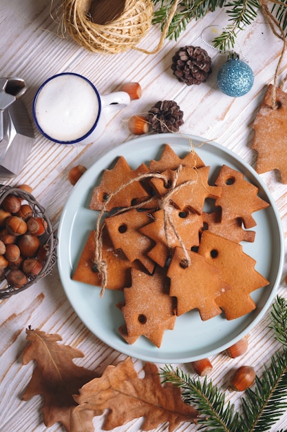 Cup of coffee and gingerbread and Christmas decorations