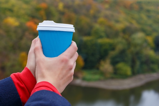 Cup of coffee in hands