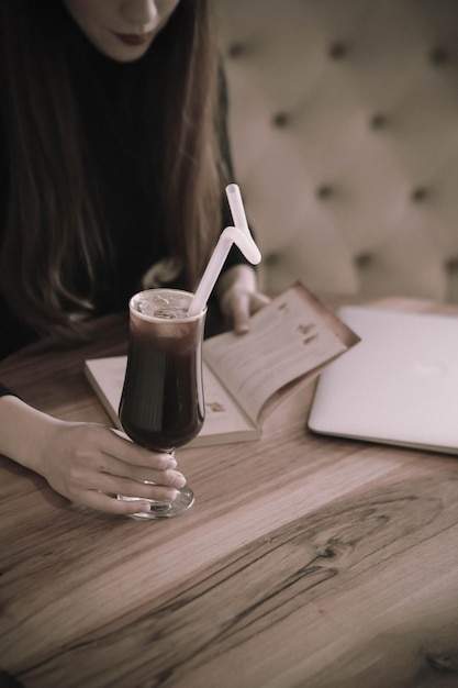 A cup of coffee while reading a book or magazine