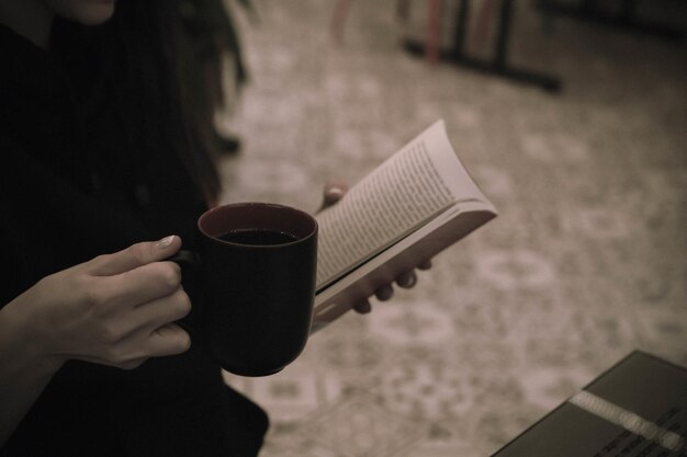 A cup of coffee while reading a book or magazine