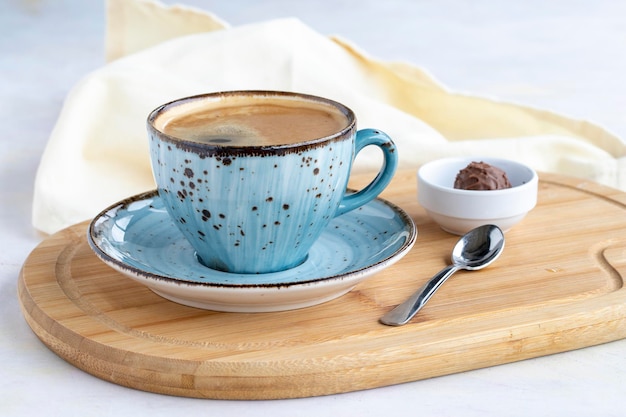 A cup of coffee on a white wooden background Local name filtre kahve