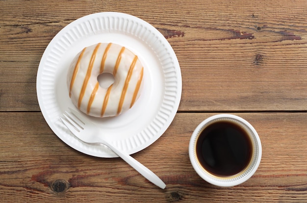 Cup of coffee with donut