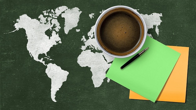 Cup of coffee with the empty paper International coffee day concept