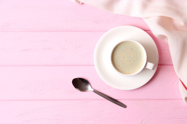 Cup of coffee with froth close up with place for text