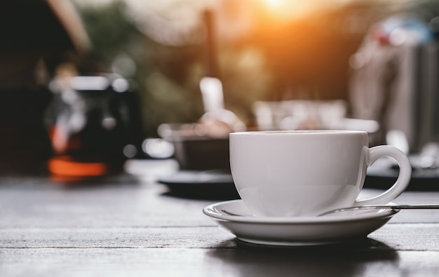 Cup of coffee on wooden table