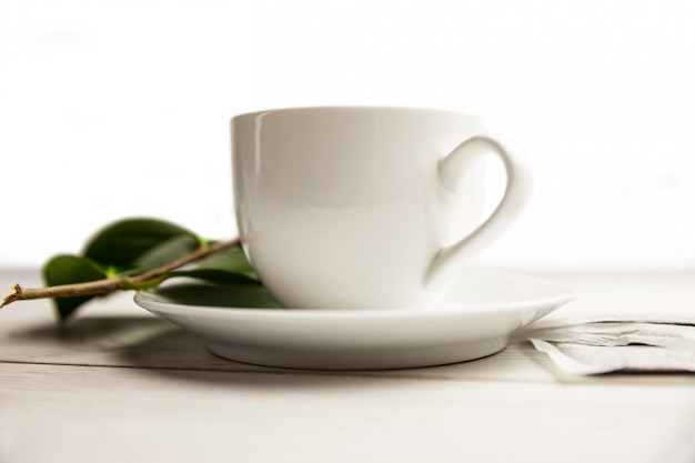 Cup of herbal tea on table shot in studio