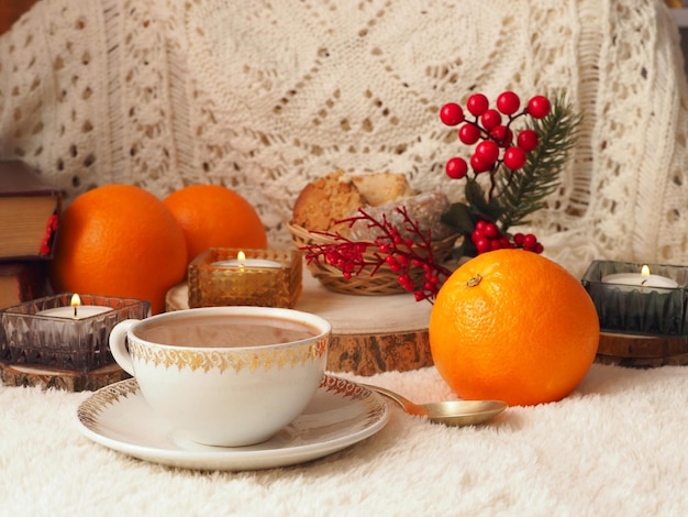 Cup of hot chocolate mantecados and polvorones oranges