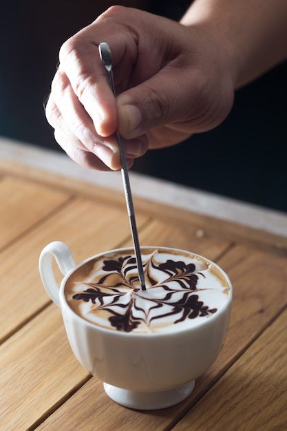 cup of hot cocoa on wood table