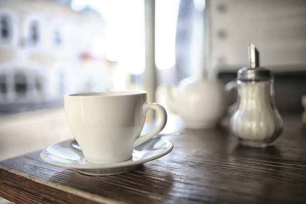 cup in an outdoor cafe / breakfast concept in a cafe, coffee, tea, morning drink