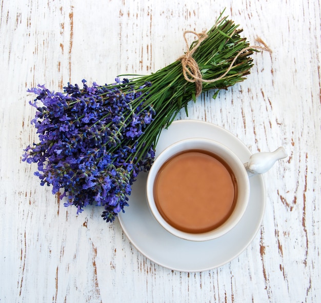 Cup of tea and lavender flowers