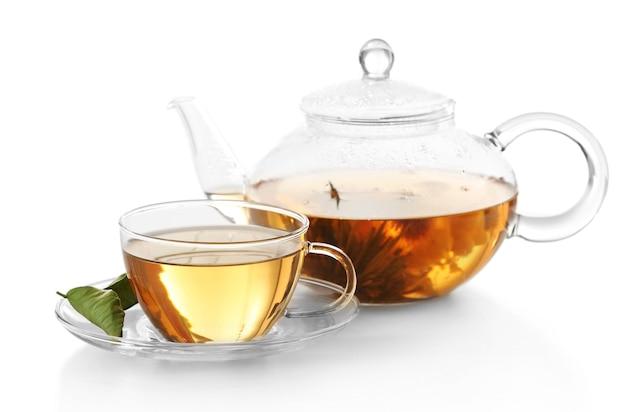 Cup of tea and teapot isolated on white