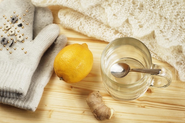 A cup of tea with lemon and ginger