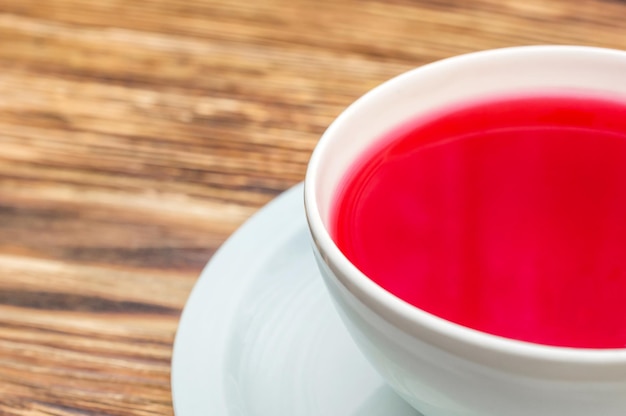 Cup of tea on the wooden table Close up