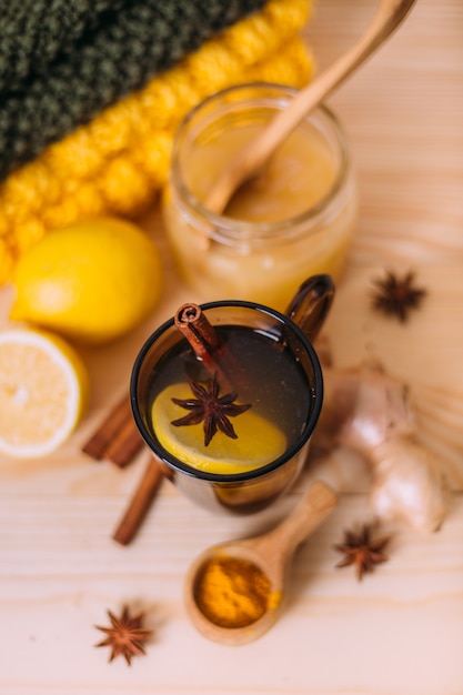 Cup warm water with lemon, honey, ginger root, cinnamon and anise.