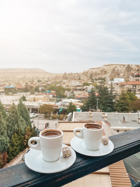 Cup with traditional Turkish coffee on a background of a valley in Cappadocia Turkey