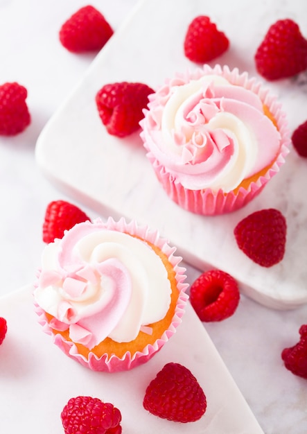 Cupcake muffin with raspberry cream dessert