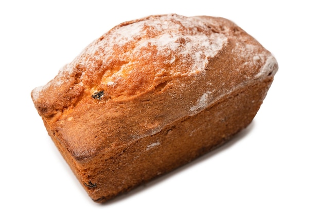 A cupcake with raisins isoalted on a white background