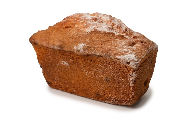 A cupcake with raisins isoalted on a white background