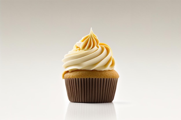 a cupcake with whipped cream isolated on grey background