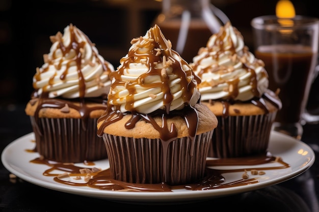 Cupcakes with chocolate flavor topped with whipped cream caramel and chocolate drizzle Iced coffee i