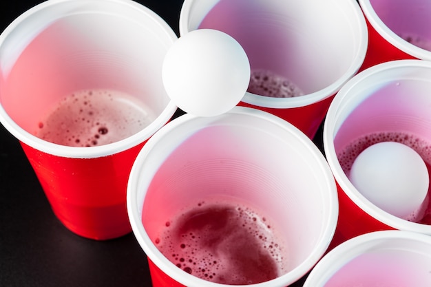 Cups for game Beer Pong on the table