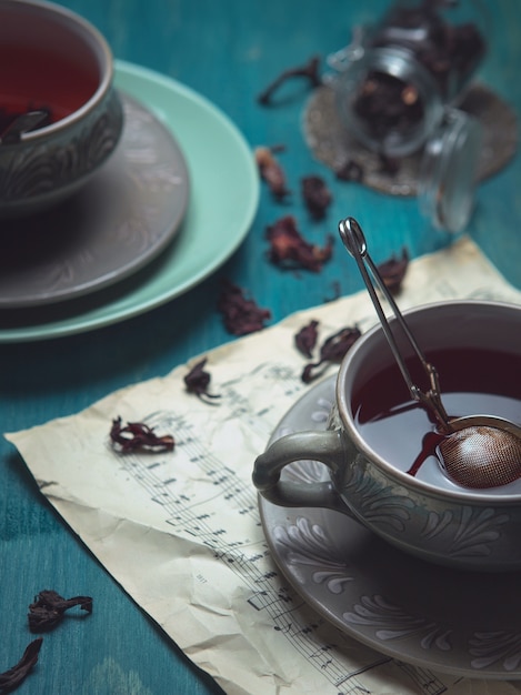 Cups of tea in a dim evening light