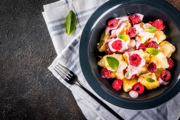 Curd gnocchi with raspberries