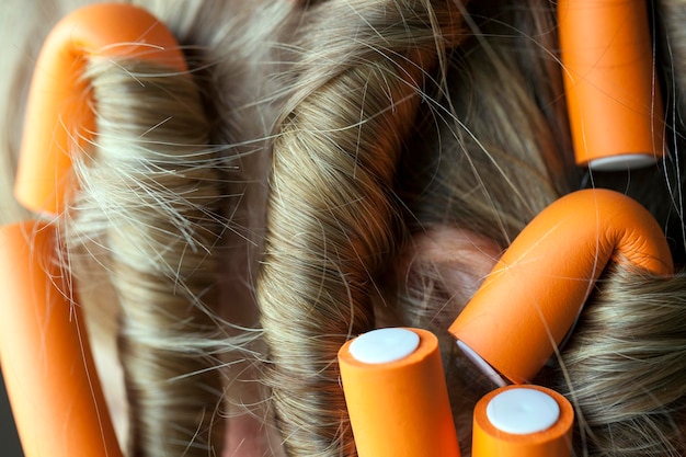 Curlers in her hair