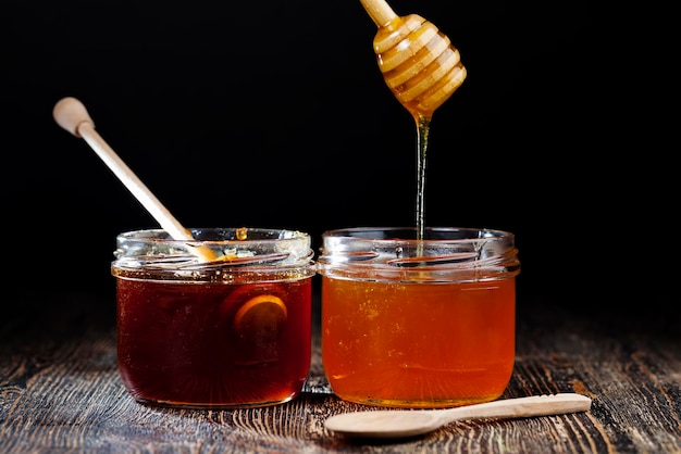 Current thick and delicious sweet honey, a natural and healthy food product created by bees, natural bee honey has a viscous and thick consistency